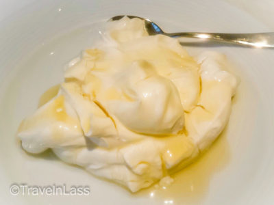 Thick Greek yougurt smothered in honey, Athens, Greece
