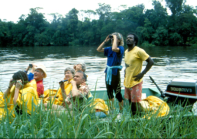 The TravelnLass guiding a small group of intrepids at Tortuguero in Costa Rica