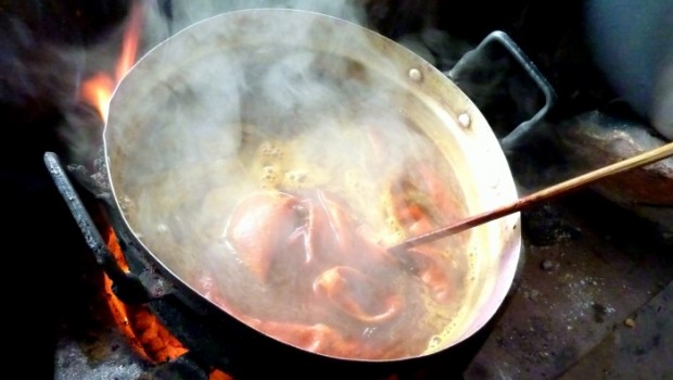 Dyeing my skein of silk in saffron - made from pulverized bark