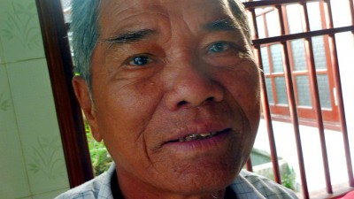 VillageManCloseUp678x383 (Re-learning Photography in Hoi Anh)