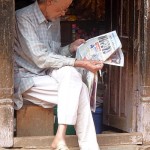 ManReadingNewspaper350x530 (Catching up on Nepal: Bhaktapur)