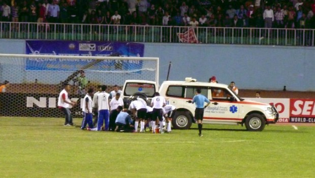 Hurt player, they took him away by ambulance.