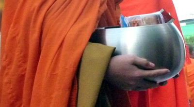 HoldingBowlCloseUp2Slider (10,000 – Yep, Ten THOUSAND Saffron-Robed Monks)