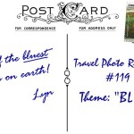 05Lyn-TheTravellingLinfieldsPostcardBACK (Travel Photo Roulette #119:  BLUE (And the winner is…))