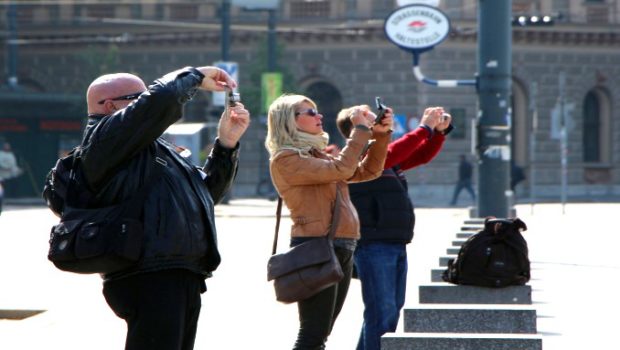 Tourists photographing the same thing.