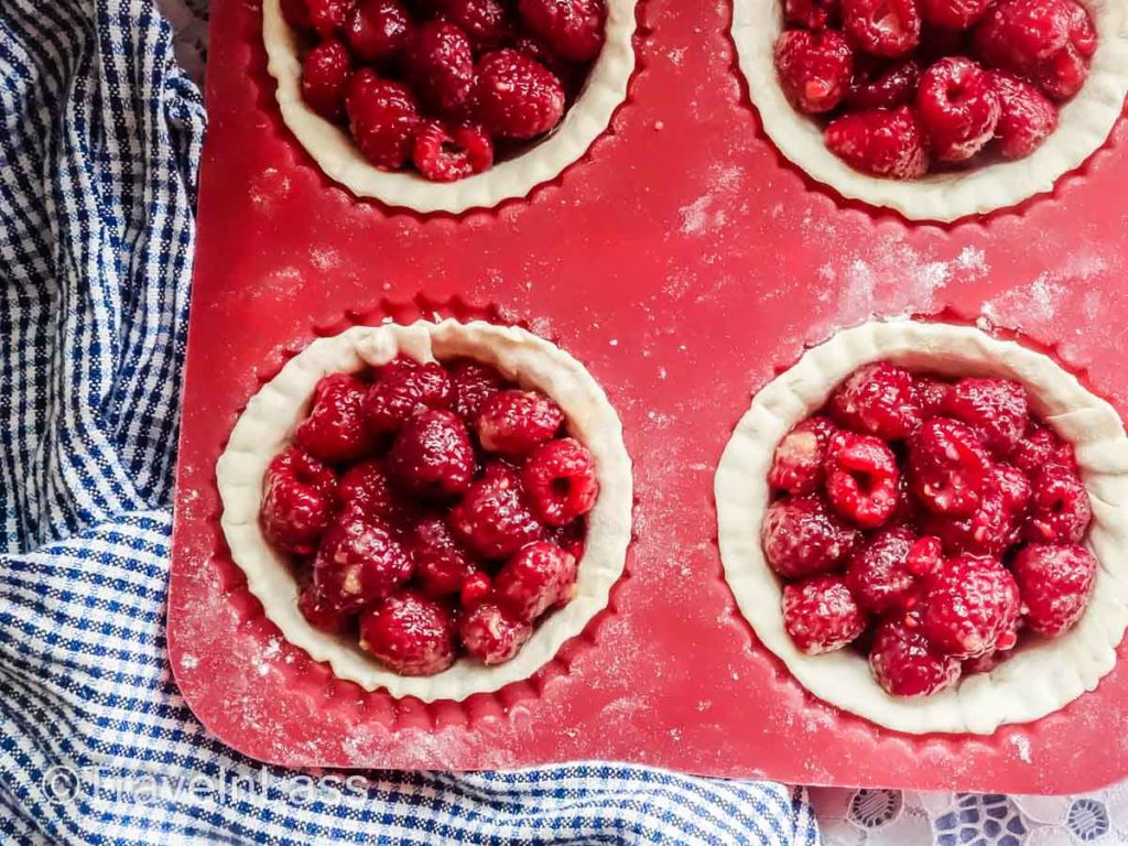 Fill each tart with the raspberry mixture.