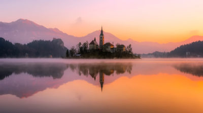 Sunrise view of Our Lady of the Lake, Bled, Slovenia. (Skipping Through the Balkans: #3 Slovenia – Lake Bled)