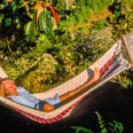 A Wanderlust takes a break: TravelnLass tour guide taking it easy in Costa Rica. (Nope, No Goofing-Off Here…)