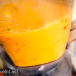 Blend the chopped hot peppers with the peeled tree tomatoes until smooth. (Easy “Ají de Tomate de Arbol” (Tree Tomato Salsa))