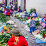 The (south) street leading to the Cusco Central Market – a bountiful collection of medicinals and flower vendors. (9 Tips for Your Machu Picchu Trip)