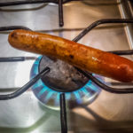 Grilling the hotdog over my gas burner… (An Expat Munchies Crisis)