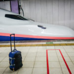 My trusty “rollie” gets its first spin on a Japanese “bullet” train. (JAPAN Adventures: Snow Monkeys, Onsens, Ryokan & Kaiseki Eats)