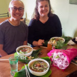 Enjoying a steamy bowl of pho in Cuenca with travelers Christine and Yung from NYC (Mystery Dinner in Cuenca!)