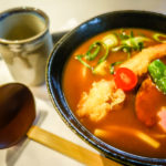 A most welcome break from the crowds: a steaming bowl of udon curry topped with a huge shrimp tempura. (Japan Adventures: Kyoto (the Fab and the Meh))